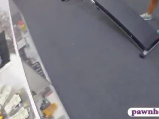 Muscular chick gets her pussy banged at the pawnshop
